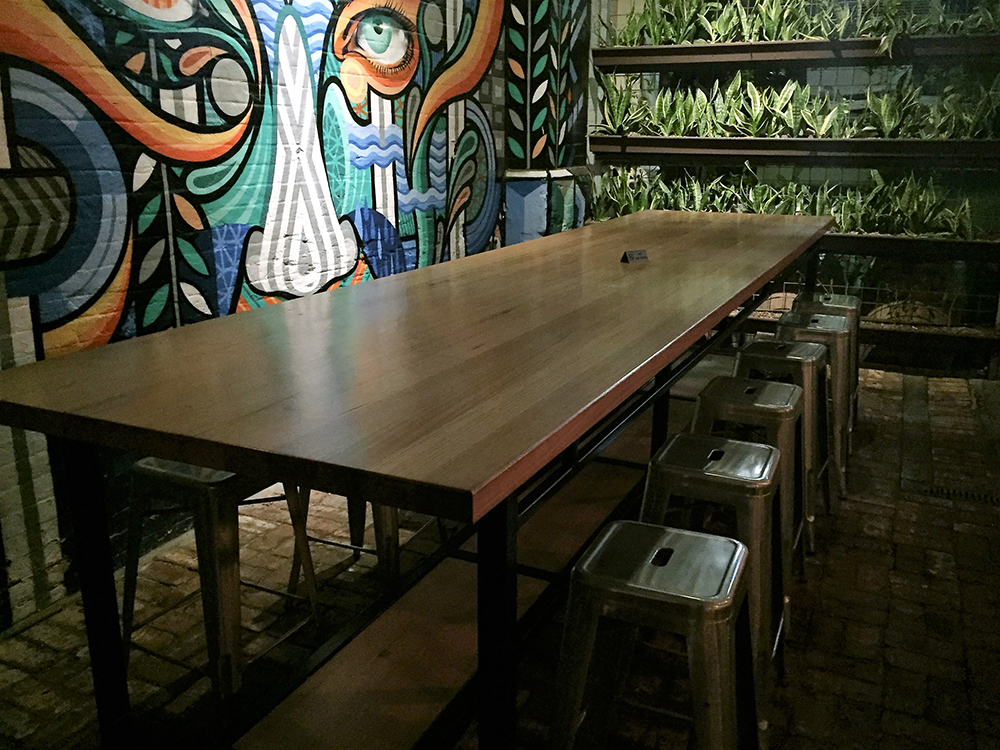 View the Oak Table designed for the Adelaide West End bar Udaberri. Oak supplied by Adelaide & Rural Salvage.
