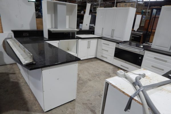 Large kitchen with stone tops